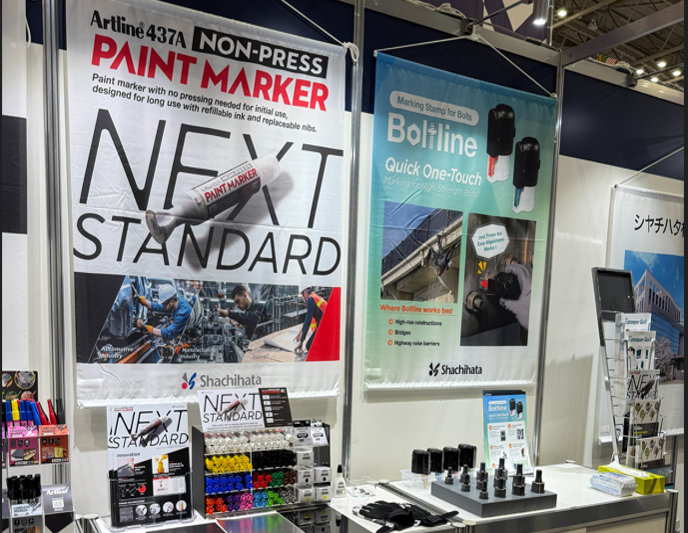 A display area showcasing industrial marking products such as the Artline NON-PRESS PAINT MARKER and Boltline