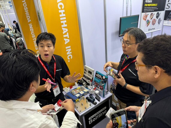 Shachihata staff explaining products to visitors at the METALEX 2025 venue
