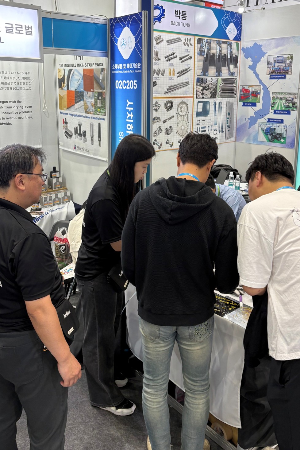 A scene showing a visit to booth 