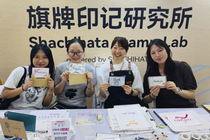 Group photo with their workshop creations
