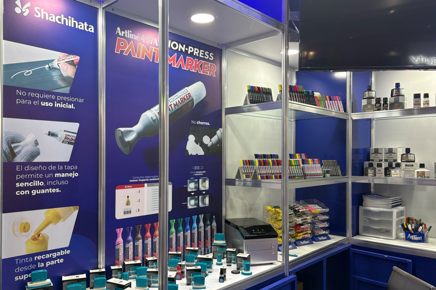 A view of the booth featuring the Quix Name Stamp and the Artline NON-PRESS PAINT MARKER.