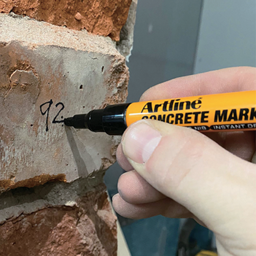 Writing on concrete with the CONCRETE MARKER.